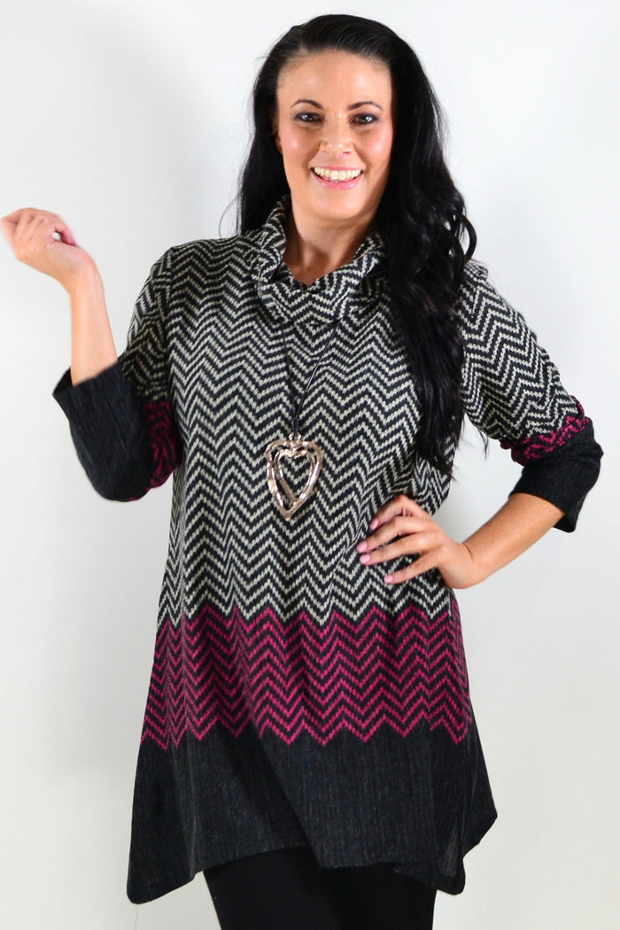 Pink Zig Zag Roll Neck Winter Tunic by Whispers, featuring a cozy knit fabric and a stylish zigzag pattern in soft pink.