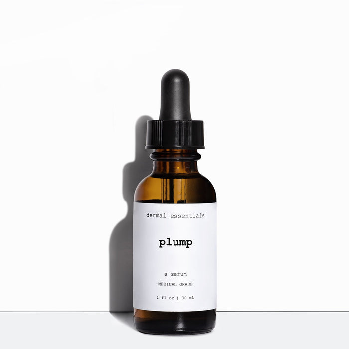 Full size 1 oz. Glass amber cylinder bottle. White label black letters black eye dropper.Best skin plumping  serum. Dermal Essentials Medical Grade Skincare. A mini size is 3 ml of this hyaluronic acid anti-aging facial serum skincare product in amber glass bottle white label with black letters black eye dropper.