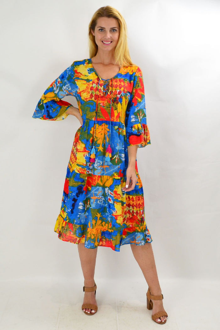 Colorful Rainbow Lily Tiered Tunic Dress by Wishstone featuring vibrant, layered fabric and a relaxed fit perfect for casual wear.