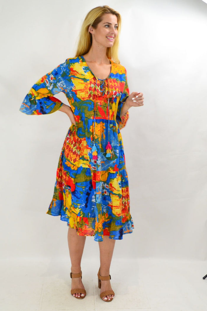 Colorful Rainbow Lily Tiered Tunic Dress by Wishstone featuring vibrant, layered fabric and a relaxed fit.