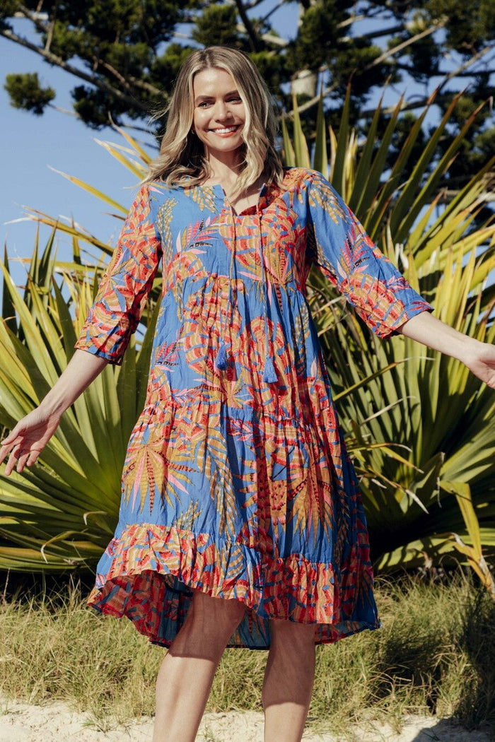 Rebecca Blue Tie Neck Tunic Dress by One Summer featuring a relaxed fit and stylish tie neckline, perfect for casual wear.
