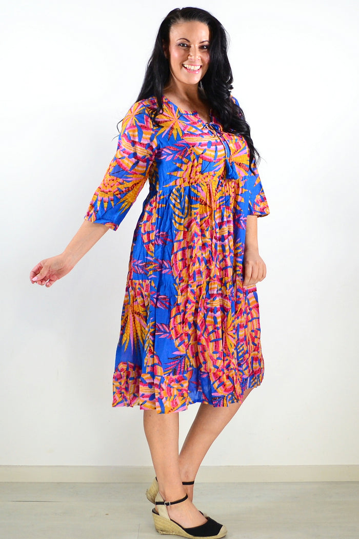 Rebecca Blue Tie Neck Tunic Dress by One Summer featuring a relaxed fit, tie neckline, and lightweight fabric.