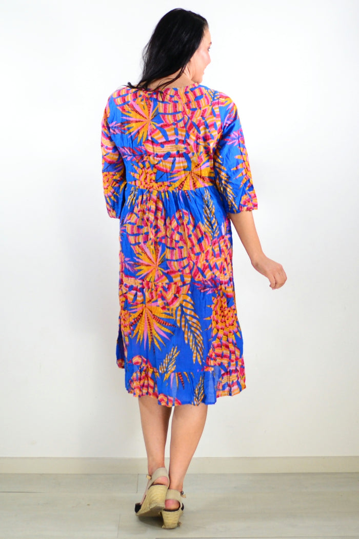 Rebecca Blue Tie Neck Tunic Dress by One Summer, featuring a stylish tie neckline and relaxed fit, displayed on a hanger.