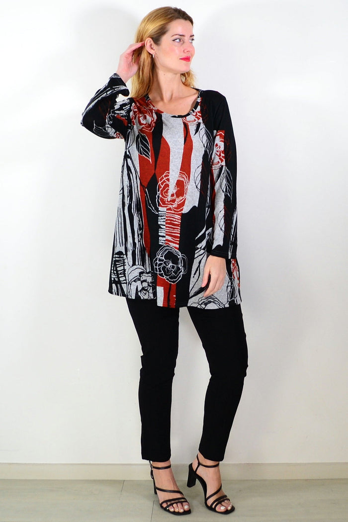 Red and grey floral print fleece tunic top by Hourglass, featuring a cozy, long-sleeve design with a relaxed fit.
