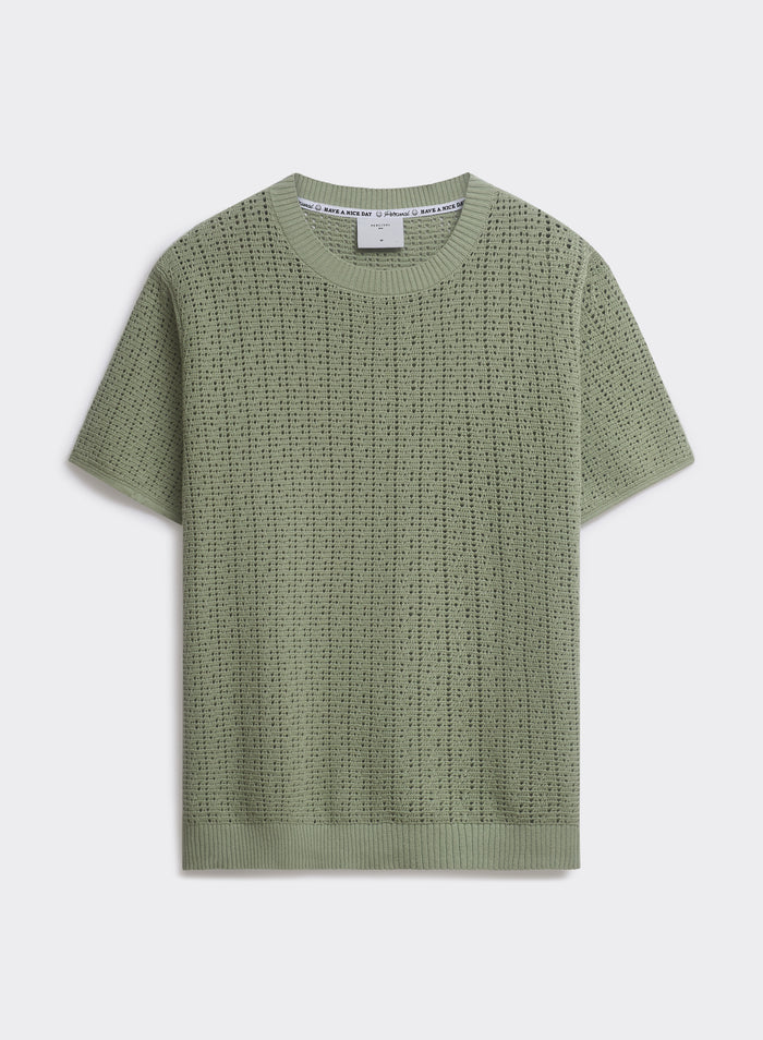 Pistachio green Percival Siena Knitted T Shirt, a 100% cotton pointelle knit tee with ribbed crew neck, shown flat.