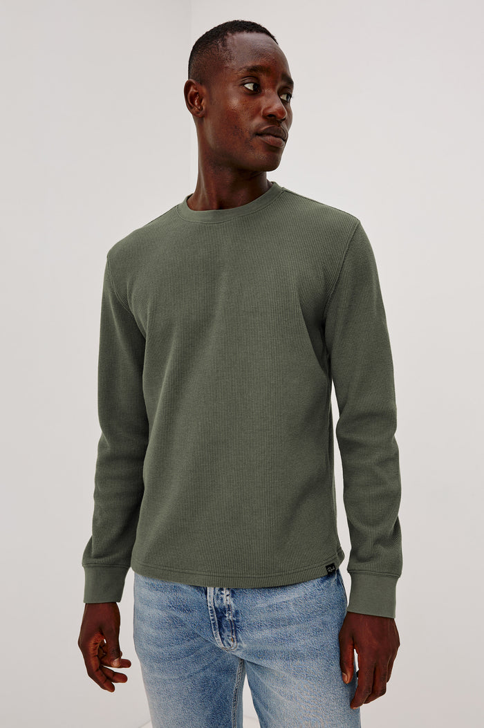 Smith Thermal in Micro-Waflle Cotton Knit With Ribbed Crew Neckline and Cuffs, and Long Sleeves in Pine Needle Colorway - Upper Body Front View Featured on Model