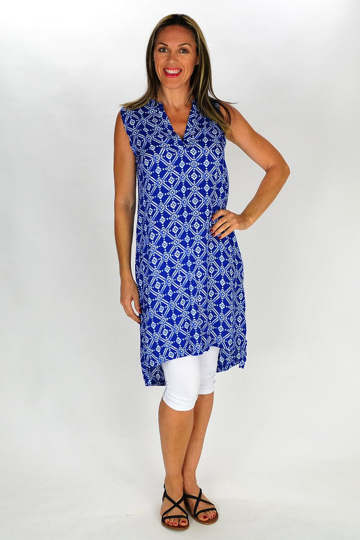 MSTYLE Snow Flake Tunic featuring a winter-themed pattern, long sleeves, and a comfortable fit, displayed on a hanger.