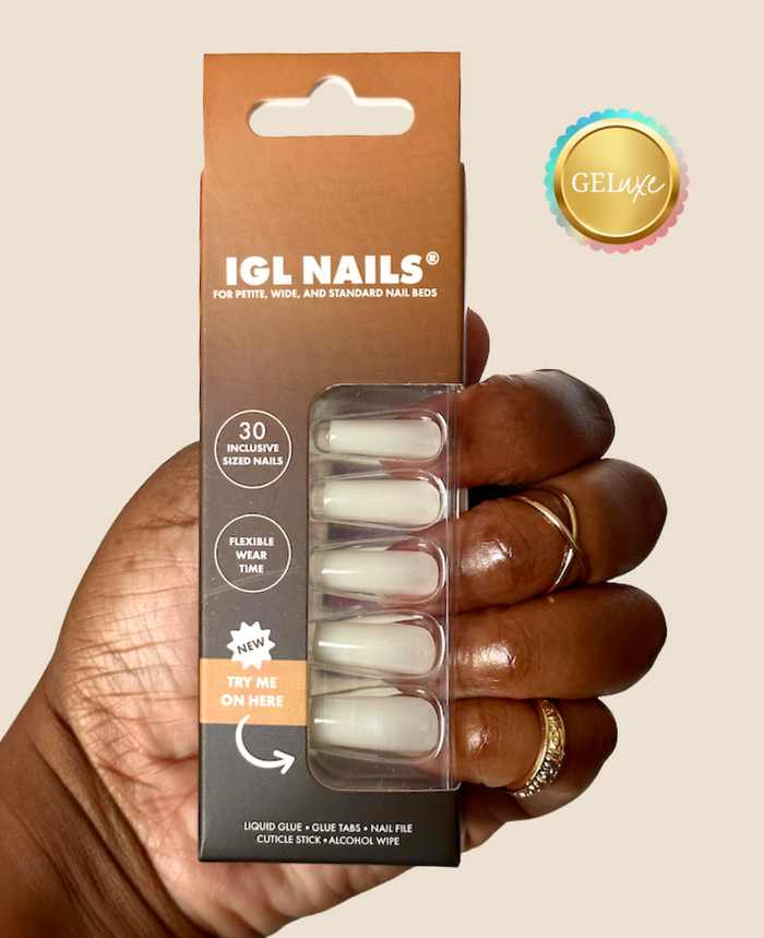 Snow Geluxe press-on nails in a milky white finish. Extra long square shape with a size-inclusive fit for petite, standard, and wide nail beds.