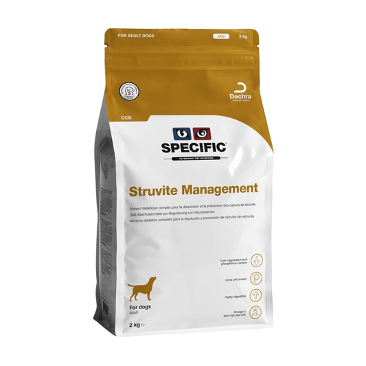 A 2 kg bag of Specific Struvite Management dog food, designed for adult dogs. The packaging features a white lower section with black and blue text, a gold logo, and a gold top seal band on a clean white background.