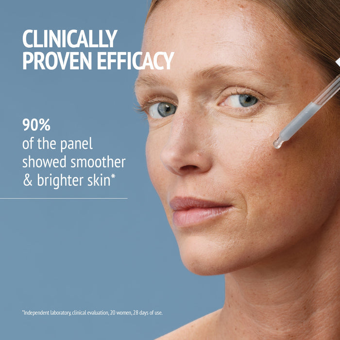 Woman applying Sublime Skin Precious Glow Drops | [ comfort zone ] serum near her cheek with a dropper, highlighting clinically proven efficacy for smoother and brighter skin.
