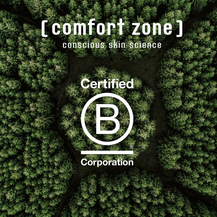 Aerial view of a dense green forest with the text "[ comfort zone ] conscious skin science Certified B Corporation" overlaid, representing the sustainable values behind Sublime Skin Precious Glow Drops | [ comfort zone ].