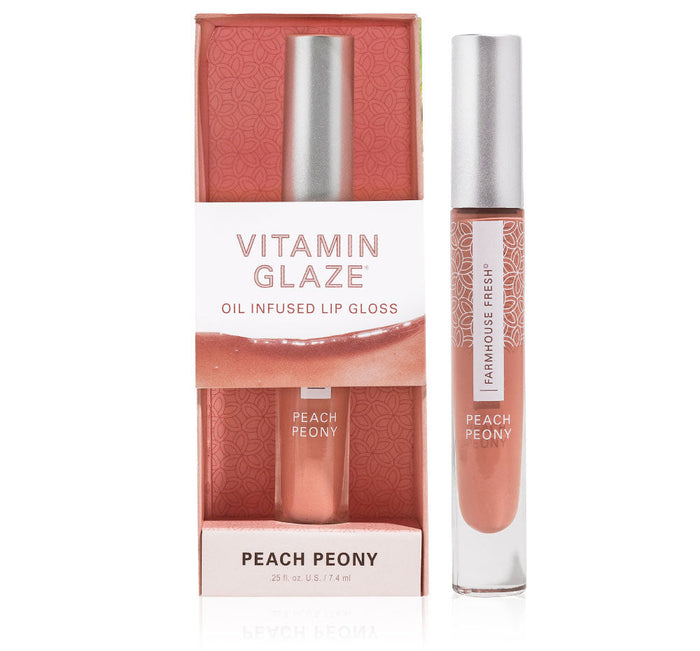 Vitamin Glaze® Oil Infused Lip Gloss – Peach Peony | Farmhouse Fresh, shown with sleek silver cap and peach-toned gloss in elegant retail packaging for lip hydration and skincare.