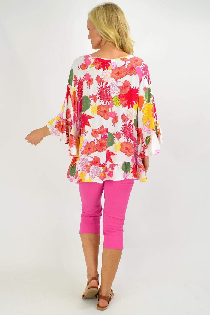 Wide sleeve multicolour floral tunic top by New U Collection featuring a loose fit and vibrant floral pattern.