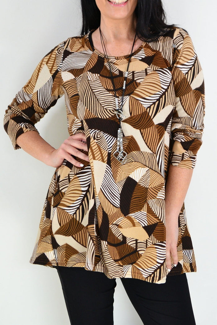 Brown fleece tunic top with winter leaf pattern, Hourglass brand, featuring a cozy, relaxed fit and seasonal leaf design.