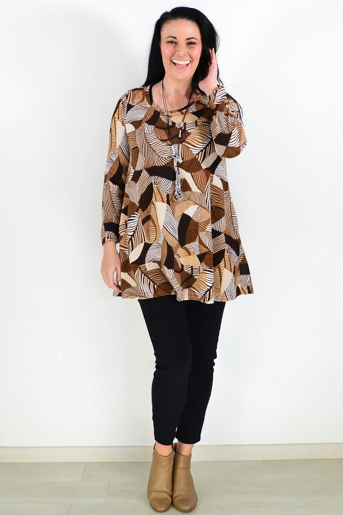 Brown fleece tunic top with winter leaf pattern by Hourglass, featuring a cozy and stylish design.