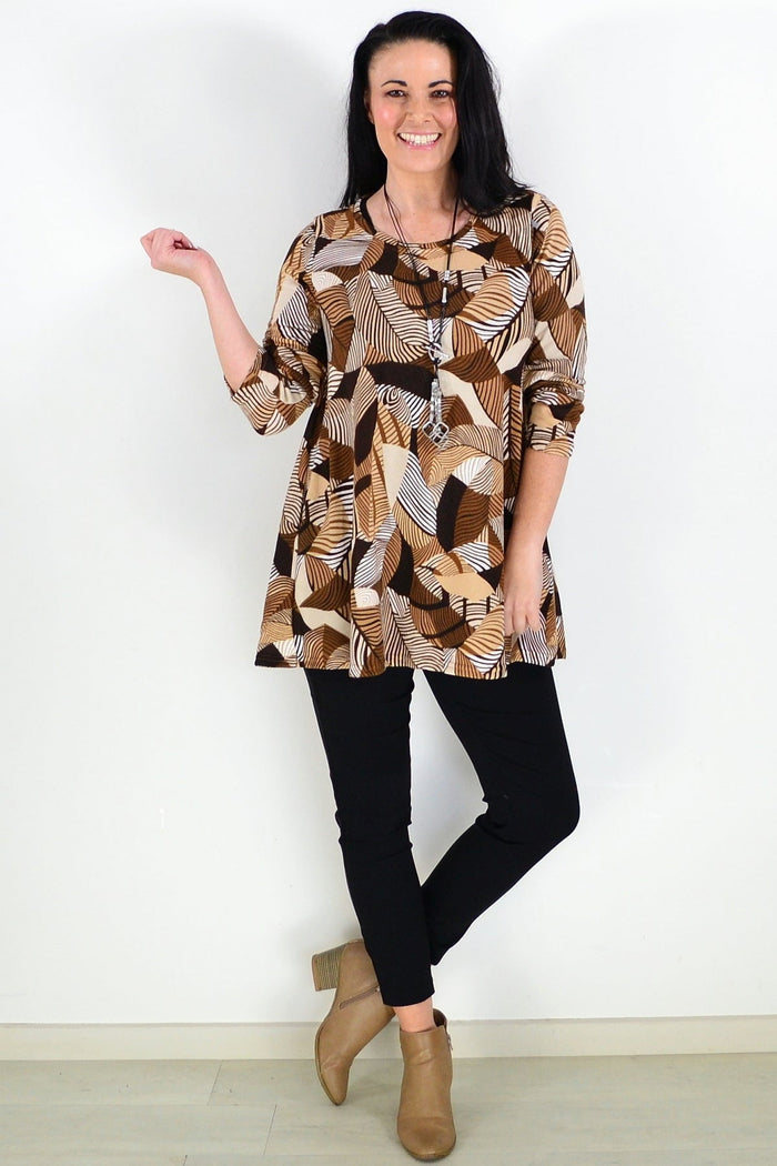 Brown fleece tunic top with winter leaf pattern by Hourglass, featuring a cozy, relaxed fit and stylish design.