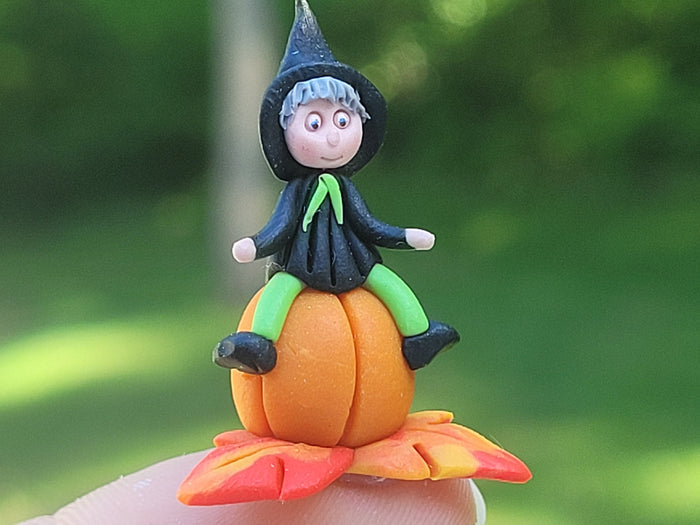 Witch and Pumpkin Made of Clay
