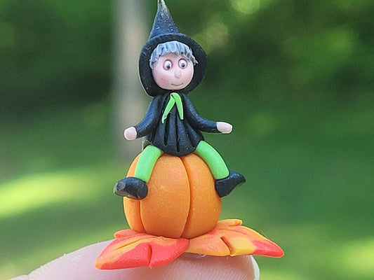 Witch and Pumpkin Made of Clay