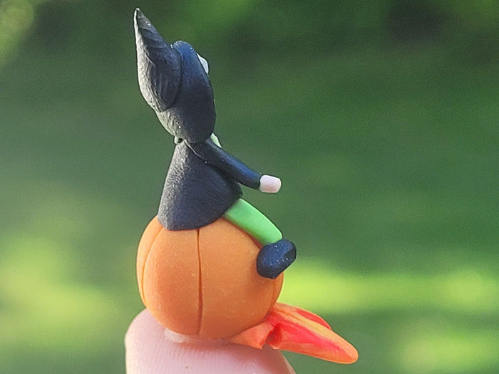 Witch and Pumpkin Made of Clay