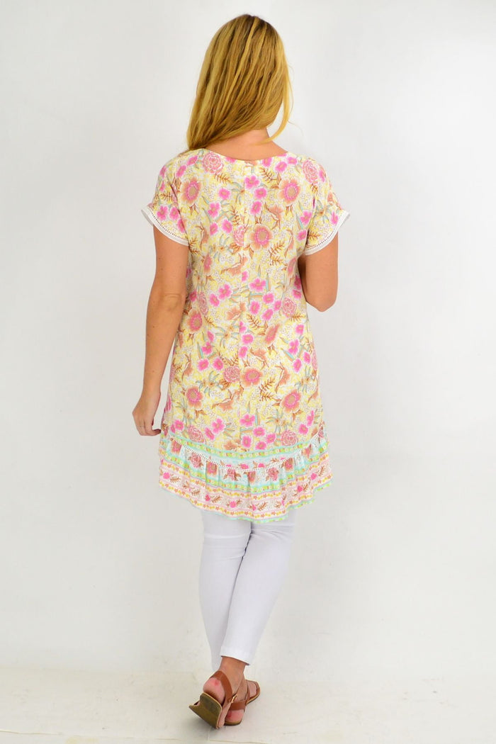 Yellow and pink floral hi-low tunic top from New U Collection with pink-beige flower pattern.
